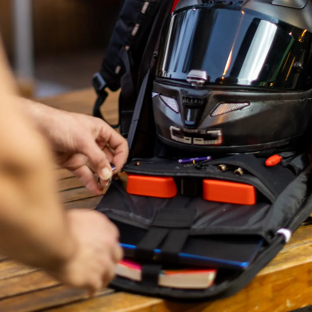 Elastic straps into the kronox hard shell backpack